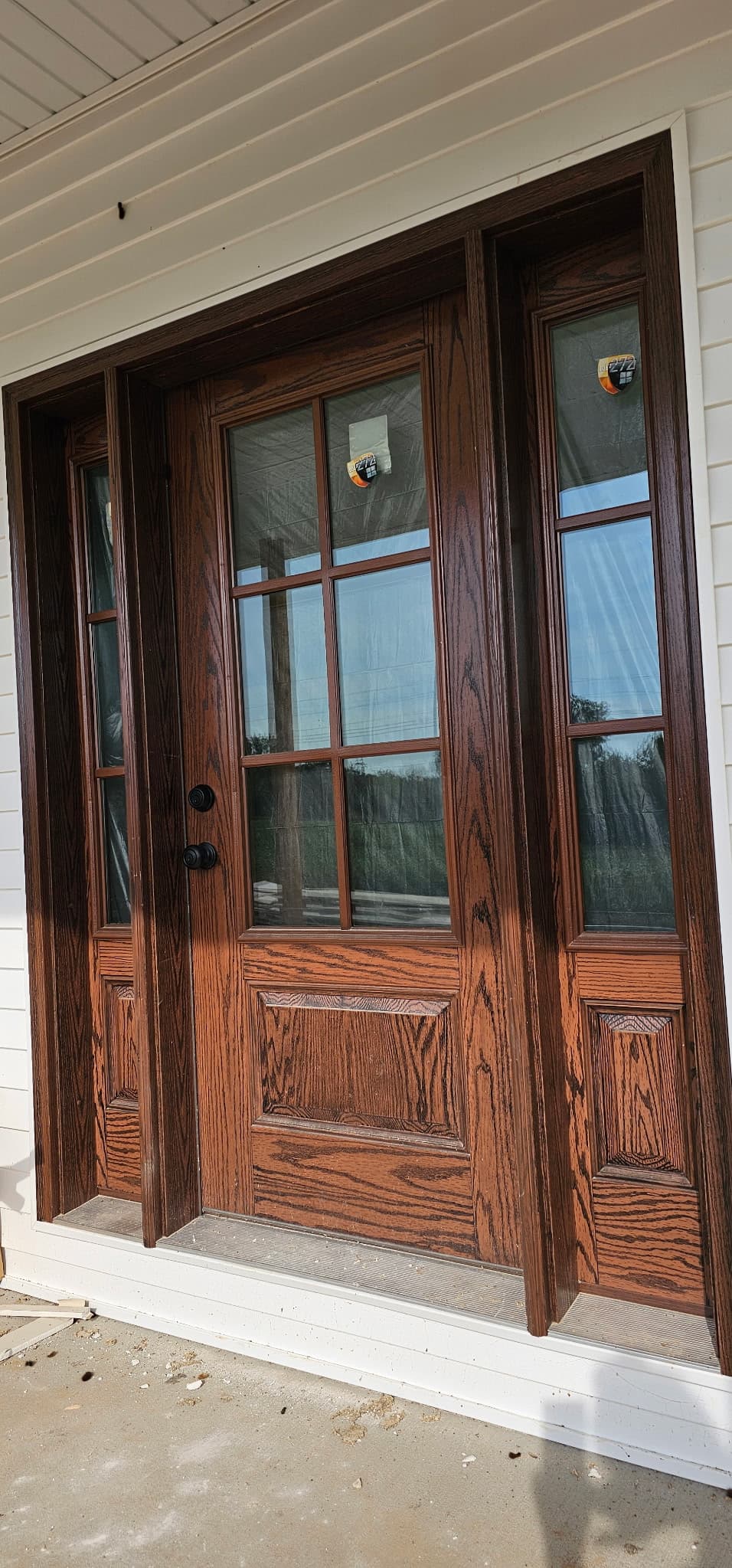 Stained Oak Entry With Sidelights