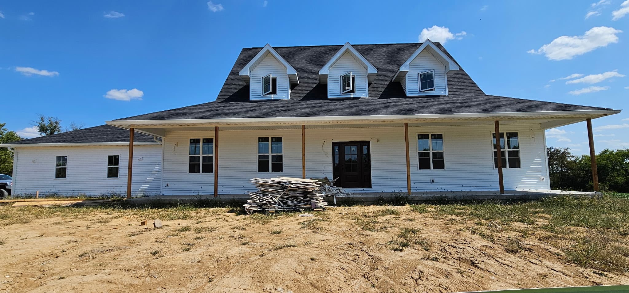 Farmhouse Wraparound Porch Dormers